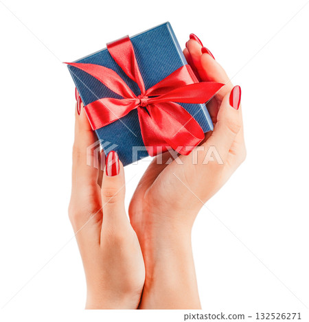 Hands holding a small elegant dark blue gift box tied with a shiny red satin ribbon, isolated on white background. Perfect image for holiday greetings, romantic occasions, and gift-giving concepts Hands holding a small elegant dark blue gift box tied with a shiny red satin ribbon, isolated on white background. Perfect image for holiday greetings, romantic occasions, and gift-giving concepts 132526271
