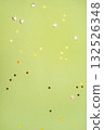 Gold confetti on green background 132526348