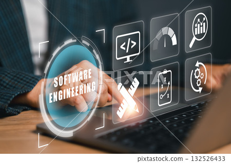Explore the dynamic world of software engineering with a digital interface showcasing programming and technology icons. 132526433