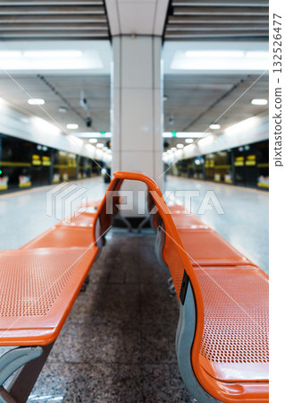 Orange seats in the subway station Orange seats in the subway station 132526477