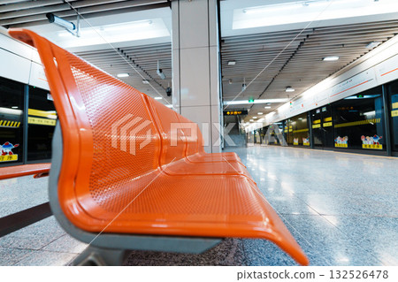Orange seats in the subway station Orange seats in the subway station 132526478