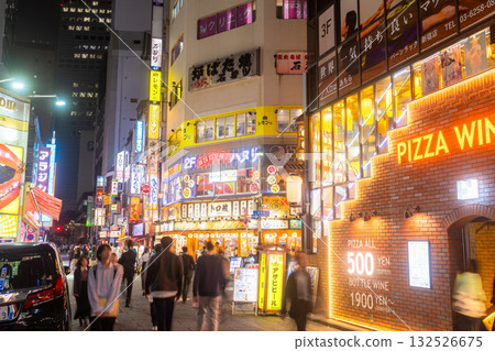 Tokyo: Shinjuku West Exit, the neon-lit entertainment district Tokyo: Shinjuku West Exit, the neon-lit entertainment district 132526675