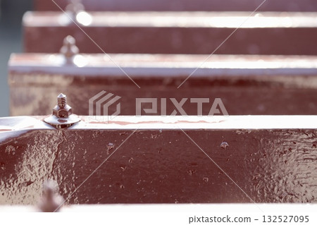Tin roof of a garage in an old house after it rains 132527095