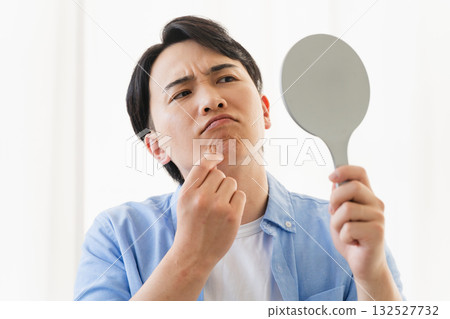 Young man doing hair care Beauty image Young man doing hair care Beauty image 132527732