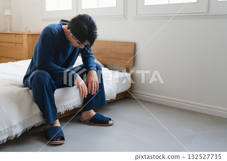 A young man who wakes up feeling unwell Lifestyle image 132527735