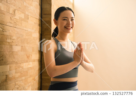 Young woman doing hot yoga beauty image 132527776