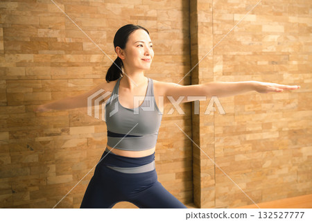 Young woman doing hot yoga beauty image 132527777