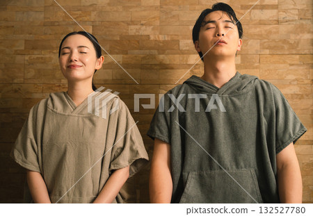 Young couple sweating in the sauna Beauty image 132527780