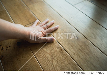 Touch the flooring Touch the flooring 132527827