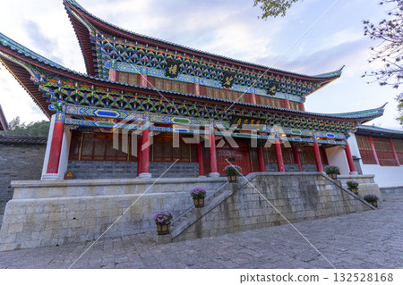 Lijiang, China - April 10, 2024 : Beautiful image of Mufu Palace in Lijiang old town at evening light in Lijiang, China on April 10, 2024. 132528168