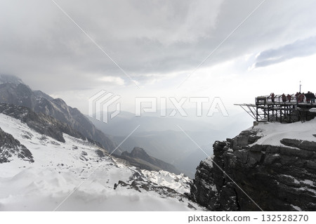 Beautiful view of Jade Dragon Snow Mountain (or Mt. Yulong) in Yulong Naxi Autonomous County, Lijiang, in Yunnan province, China. Beautiful view of Jade Dragon Snow Mountain (or Mt. Yulong) in Yulong Naxi Autonomous County, Lijiang, in Yunnan province, China. 132528270