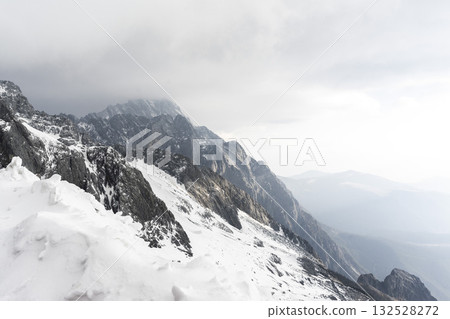 Beautiful view of Jade Dragon Snow Mountain (or Mt. Yulong) in Yulong Naxi Autonomous County, Lijiang, in Yunnan province, China. 132528272