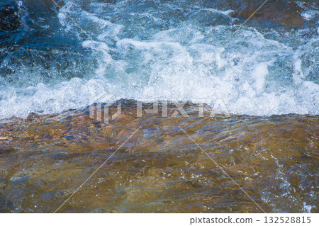 Clear streams sparkling in the early summer sunshine 68 132528815