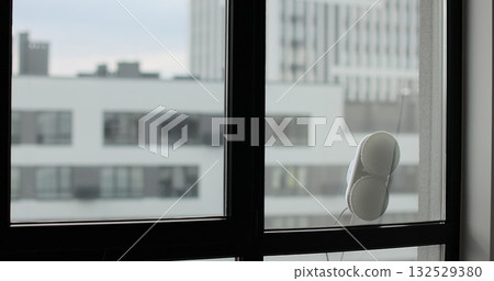 Robotic window cleaner, innovative automation for modern living and smart homes. Polishing of the glass surface. 132529380