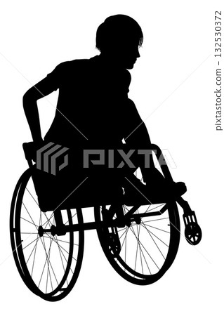 Silhouette of Man Performing Wheelchair Trick 132530372