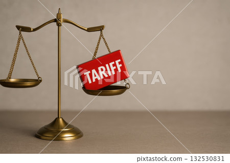 Red block with tariff text on balance scale symbolizing global trade tariffs impact on economy and market balance in international commerce and financial regulation 132530831