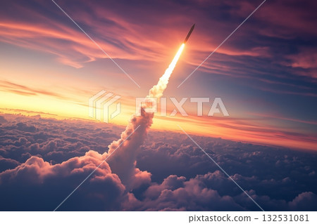 Rocket launching into a clear blue sky with billowing clouds during daytime 132531081