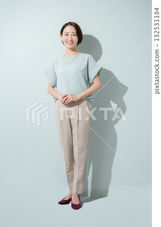 Beautiful mint green background, business woman image, full body Beautiful mint green background, business woman image, full body 132531184