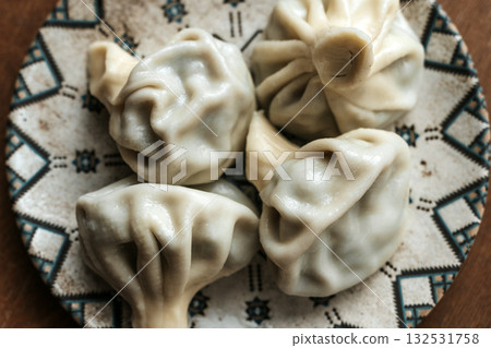 Georgian Khinkali. Traditional Dumplings on Plate Georgian Khinkali. Traditional Dumplings on Plate 132531758