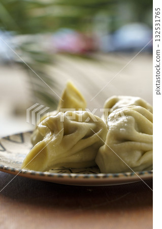 Georgian Khinkali. Traditional Dumplings on Plate Georgian Khinkali. Traditional Dumplings on Plate 132531765