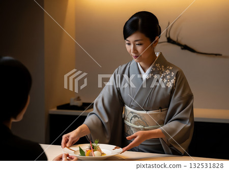 Hospitality in a sophisticated space: Japanese cuisine served by women in kimonos 132531828