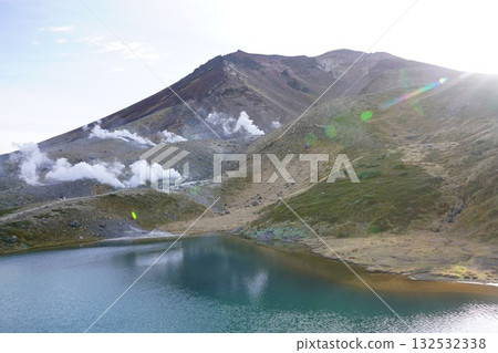 Smoke from the Asahidake hiking trail and Sugatami Pond Smoke from the Asahidake hiking trail and Sugatami Pond 132532338