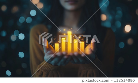 Businesswoman holding a glowing financial chart, symbolizing success and growth in investments, with blurred lights in the background Businesswoman holding a glowing financial chart, symbolizing success and growth in investments, with blurred lights in the background 132534090