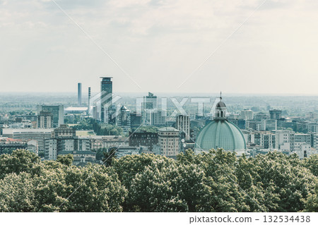 Vintage toned panorama of Brescia from castle hill highlighting New Cathedral dome and skyline 132534438