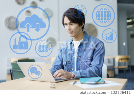 DX Digital Image: A young man operating a computer in a cafe. Photo courtesy of Sky Perfect Tokyo Media Center. DX Digital Image: A young man operating a computer in a cafe. Photo courtesy of Sky Perfect Tokyo Media Center. 132536411