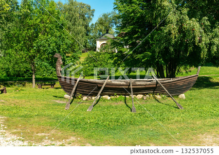 Old Wooden Boat with Oars on Grass, Kirillo-Belozersky Monastery, Russia Old Wooden Boat with Oars on Grass, Kirillo-Belozersky Monastery, Russia 132537055