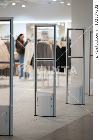 A sleek, transparent security gate A sleek, transparent security gate 132537232