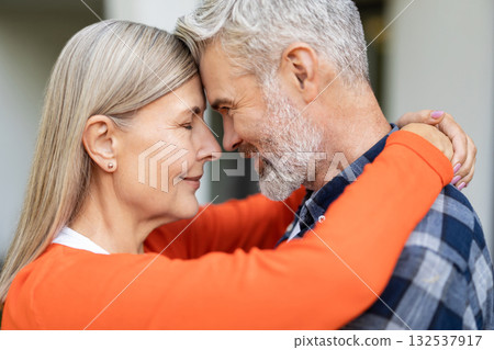 Mature couple enjoying time together and looking happy Mature couple enjoying time together and looking happy 132537917