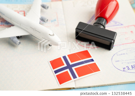 Norway passport with approved stamp on document for tourism to immigration at airport in country. 132538445