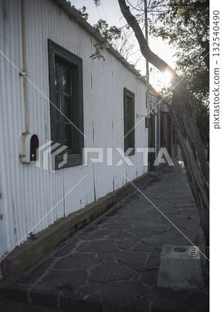 Picturesque typical construction in the town of Puerto Piramides, Peninsula Valdes, Chubut Province, Patagonia, Argentina. Picturesque typical construction in the town of Puerto Piramides, Peninsula Valdes, Chubut Province, Patagonia, Argentina. 132540490