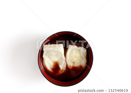 Oshiruko with grilled mochi on a white background viewed from directly above Oshiruko with grilled mochi on a white background viewed from directly above 132540619