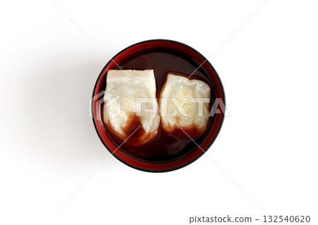 Oshiruko with grilled mochi on a white background viewed from directly above Oshiruko with grilled mochi on a white background viewed from directly above 132540620
