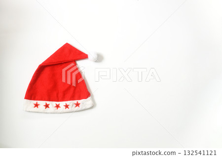 Christmas sparkling Santa Claus hat on white background. Christmas sparkling Santa Claus hat on white background. 132541121