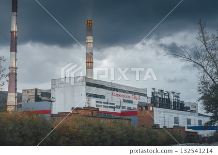 Krasnoyarsk TPP 2 in the evening. Smoking pipes speak about the poor ecology in the city, the black sky regime. Heating season in apartments. Krasnoyarsk TPP 2 in the evening. Smoking pipes speak about the poor ecology in the city, the black sky regime. Heating season in apartments. 132541214