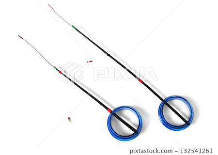 Fitted fishing rods for winter fishing on a white background, close-up Fitted fishing rods for winter fishing on a white background, close-up 132541261