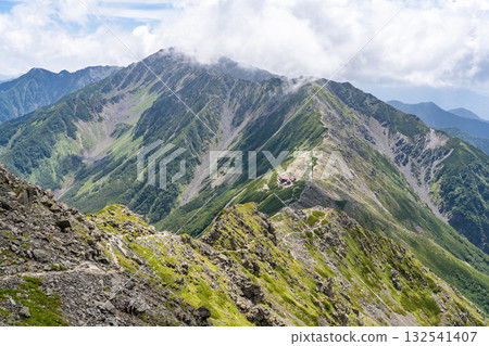 Ainodake and the ridgeline seen from the Tsurione junction of Kitadake. Climbing Kitadake in the Southern Alps Ainodake and the ridgeline seen from the Tsurione junction of Kitadake. Climbing Kitadake in the Southern Alps 132541407