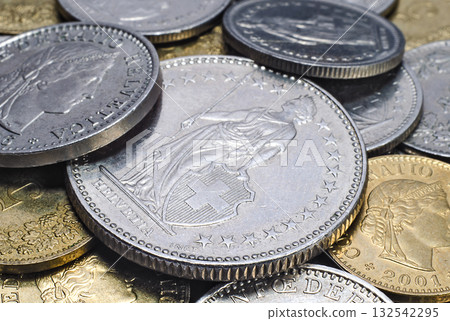 Heap of Swiss coins close up 132542295