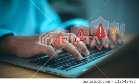 Cybersecurity Alert and Data Protection Warning on Laptop Computer Cybersecurity Alert and Data Protection Warning on Laptop Computer 132542458
