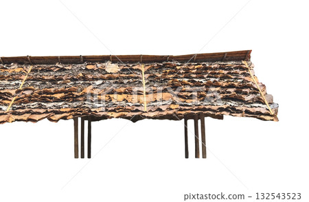 Thatched roof made of overlapping dried leaves with clipping path Thatched roof made of overlapping dried leaves with clipping path 132543523