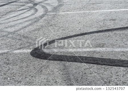 Asphalt with drift traces of tires 132543707