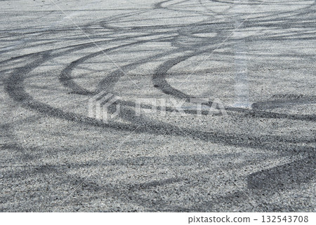 Asphalt with traces of tires 132543708