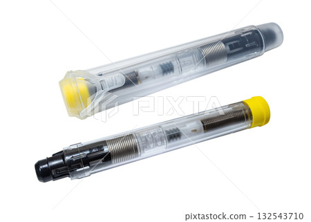 Auto injector syringes with adrenaline isolated on a white background Auto injector syringes with adrenaline isolated on a white background 132543710