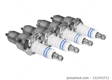 Automobile spark plugs on a white surface 132543711