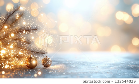 Magical Christmas holiday background with glowing tree branch, golden ornaments, and glittering bokeh lights for festive celebration 132544029