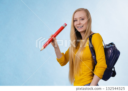 Young woman going to school Young woman going to school 132544325