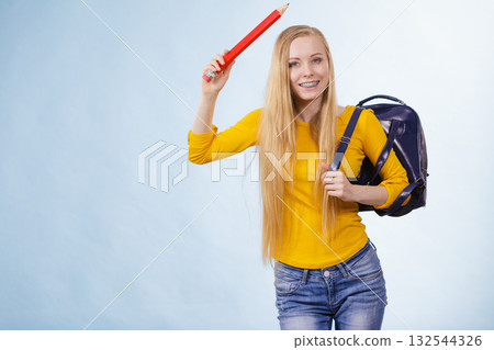 Young woman going to school Young woman going to school 132544326